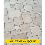 3 cm kalınlığında açık renkli traverten levha ile döşeme kaplaması yapılması (3cmx30-40-50cmxserbest boy) (honlu veya cilalı) (Malzeme Dahil)